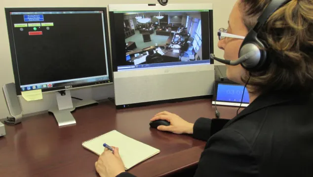 A remote court interpreter working